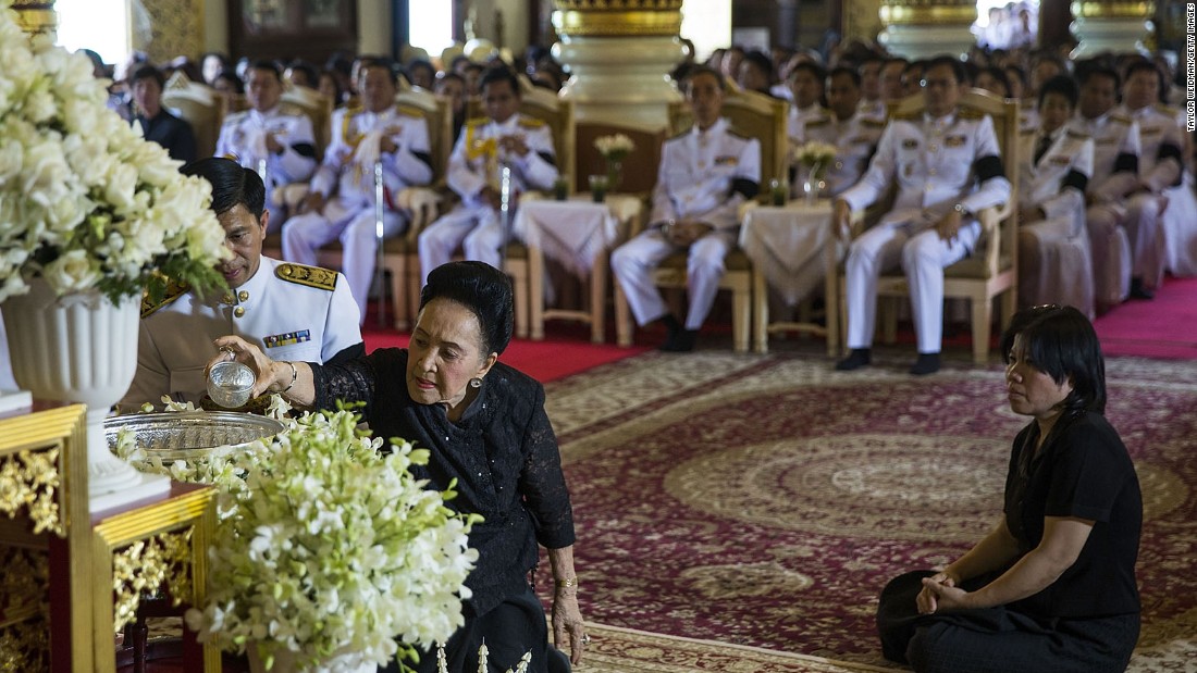 Dignitaries participate in a ceremony commemorating the King at Wat Phra Singh on Friday in Chiang Mai.