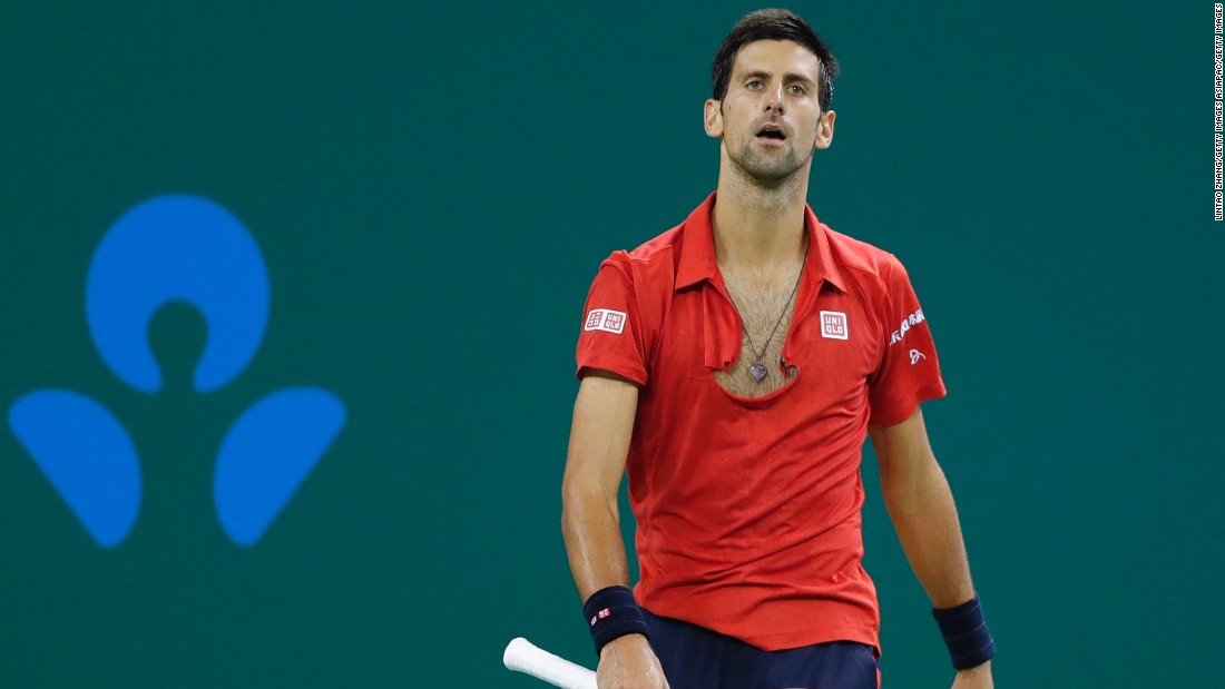 Novak Djokovic tears shirt, smashes racket in Shanghai Masters ...