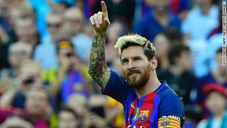 Lionel Messi celebrates scoring on his return from injury.