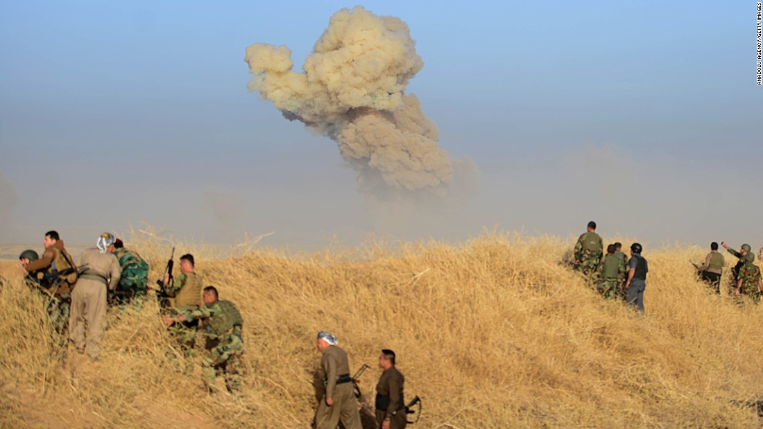 Smoke rises from a suicide car bomb attack carried out by ISIS in the village of Bedene on October 17.