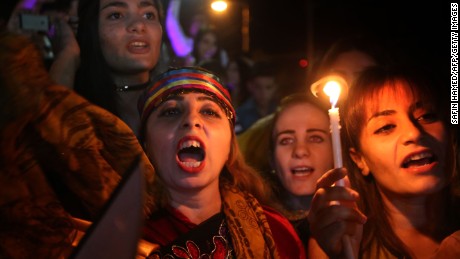 Iraqi Christians celebrate Tuesday in Irbil after Iraqi forces entered their hometown of Qaraqosh.