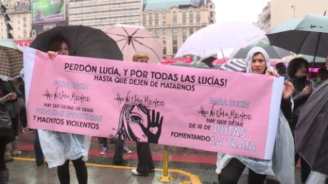 Protesters in Buenos Aires braved torrential rains to protest the rape and killing of a teenager who was abducted outside her school earlier this month.