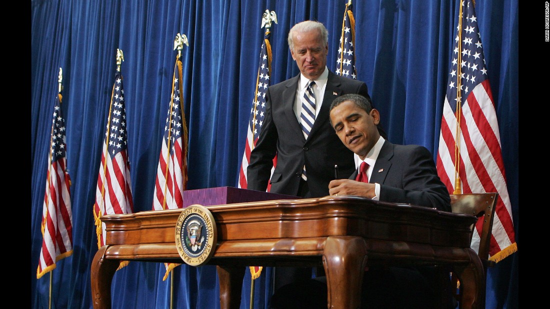 Vice President Joe Biden watches Obama sign &lt;a href=&quot;http://www.cnn.com/2010/POLITICS/02/17/economic.stimulus.2010/&quot; target=&quot;_blank&quot;&gt;the economic stimulus bill&lt;/a&gt; on February 17, 2009. The goal was to stimulate the country&#39;s staggering economy by increasing federal spending and cutting taxes.