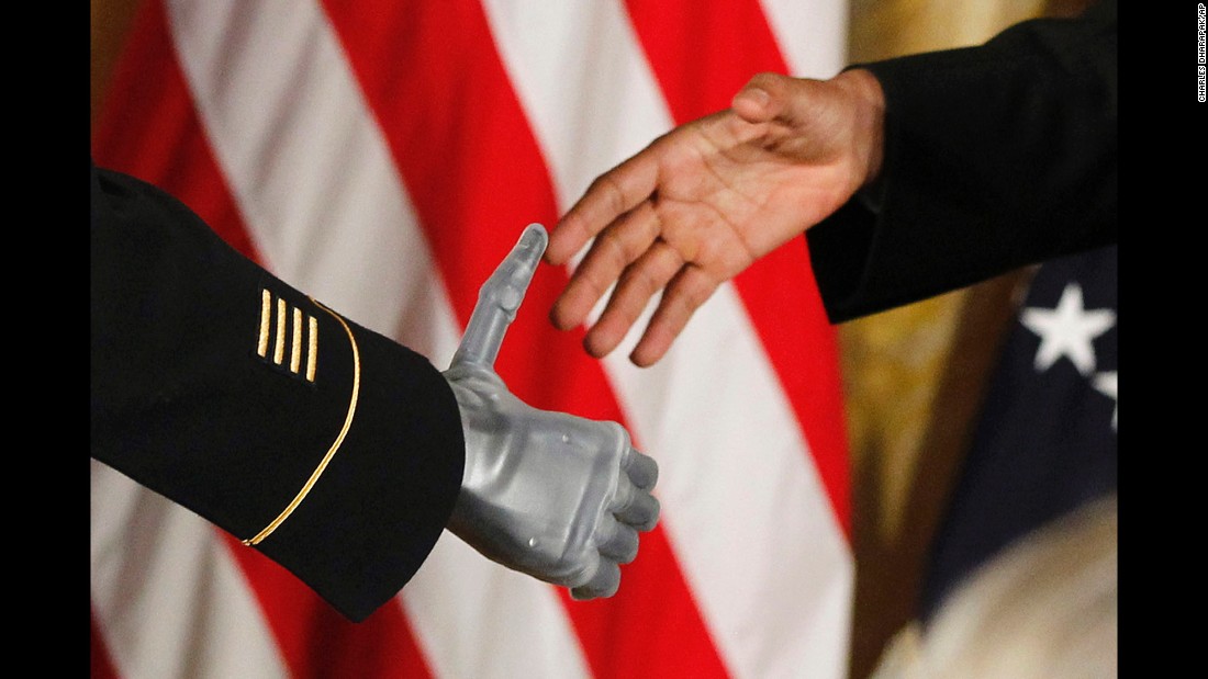 Obama shakes the prosthetic hand of Army Sgt. 1st Class Leroy Arthur Petry on July 12, 2011. Petry was at the White House &lt;a href=&quot;http://www.cnn.com/2011/POLITICS/07/12/medal.of.honor/&quot; target=&quot;_blank&quot;&gt;to receive the Medal of Honor.&lt;/a&gt; The Army Ranger lost his hand while tossing an enemy grenade away from fellow soldiers in Afghanistan.