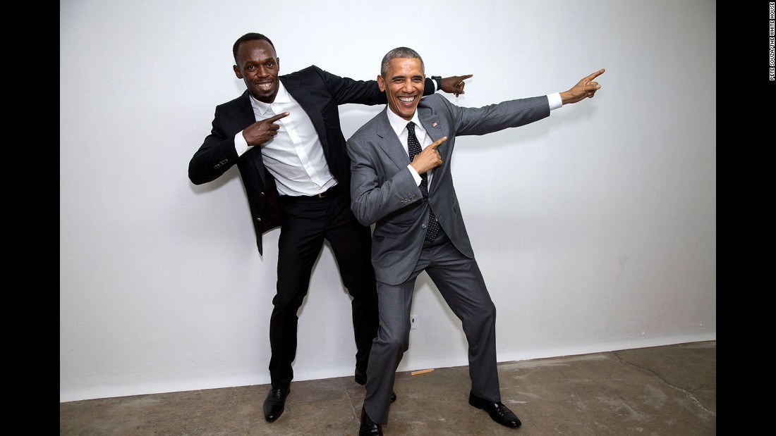 Obama poses with the world&#39;s fastest man, Jamaican sprinter Usain Bolt, at an event in Kingston, Jamaica, on April 9, 2015.