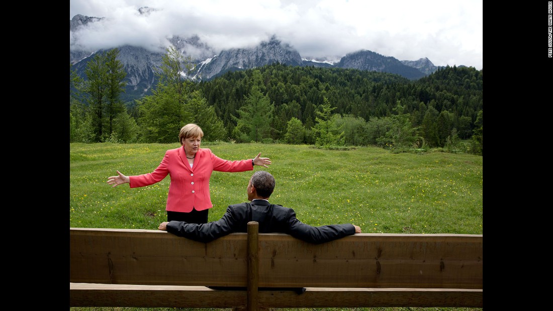 German Chancellor Angela Merkel talks with Obama &lt;a href=&quot;http://www.cnn.com/2015/06/08/politics/barack-obama-angela-merkel-photo-germany-mountains/&quot; target=&quot;_blank&quot;&gt;near the Bavarian Alps&lt;/a&gt; on June 8, 2015. Obama and other world leaders were in Germany for the annual G-7 Summit. &quot;Merkel asked the leaders and outreach guests to make their way to a bench for a group photograph,&quot; White House Photographer Pete Souza said. &quot;The President happened to sit down first, followed closely by the Chancellor. I only had time to make a couple of frames before the background was cluttered with other people.&quot;