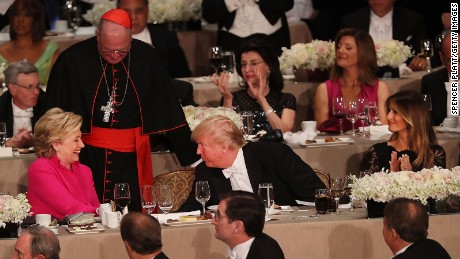 Hillary Clinton speaks briefly with Donald Trump while attending the annual Alfred E. Smith Memorial Foundation Dinner at the Waldorf Astoria on October 20, 2016 in New York City.