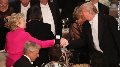 Hillary Clinton shakes hands with Donald Trump while attending the annual Alfred E. Smith Memorial Foundation Dinner at the Waldorf Astoria on October 20, 2016 in New York City.