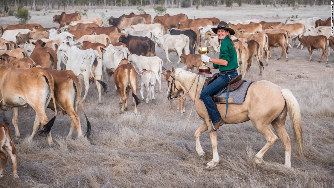 Jillaroo Kelly Smith musters the cattle at Table Top Station outside Croydon, Queensland.
