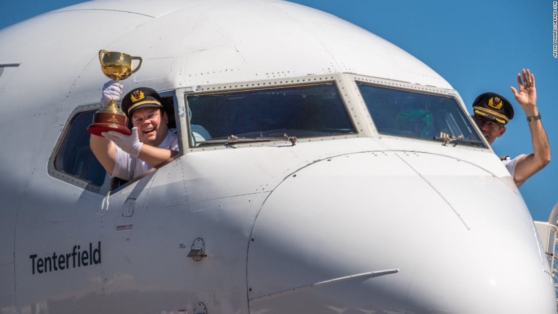 Pilots on board a flight from Perth to Broome before the trophy embarks on the next leg of its journey.