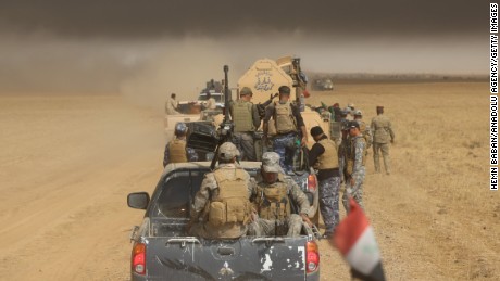 Iraqi army and militia forces arrive Thursday in Saleh village in the offensive to wrest Mosul from ISIS.