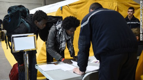 Migrants on Monday registered to claim asylum in France and be settled in different regions.