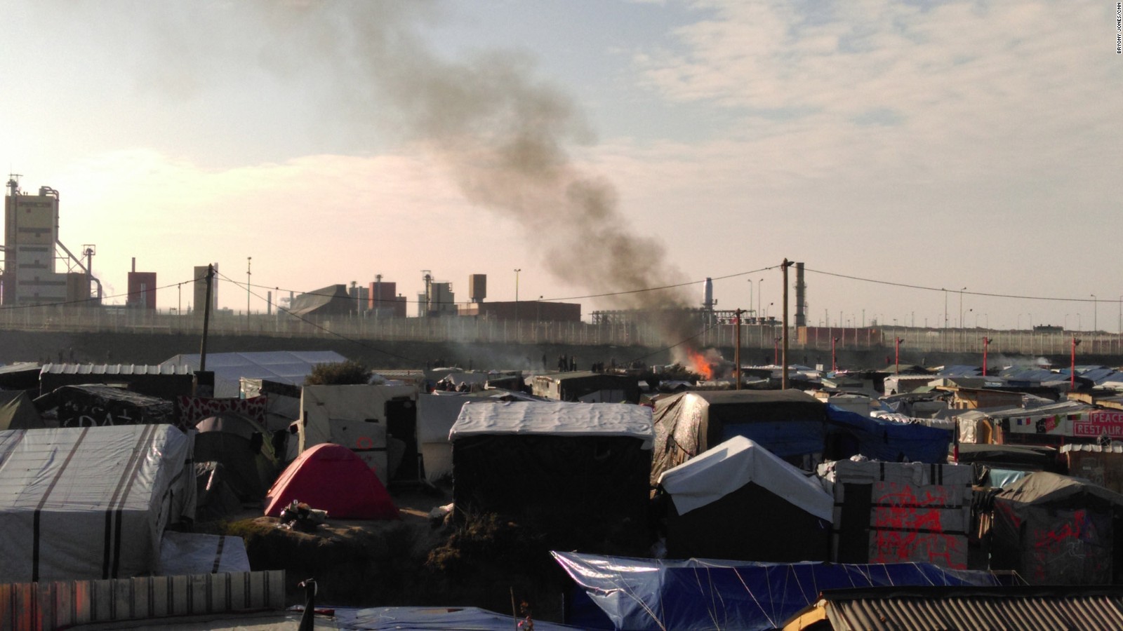 Calais migrant camp demolition begins - CNN Video