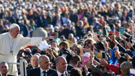 Pope Francis greets the crowd in St. Peter&#39;s square.