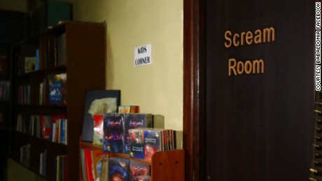 The scream room can be found right next to the smaller shelves by the children corner.
