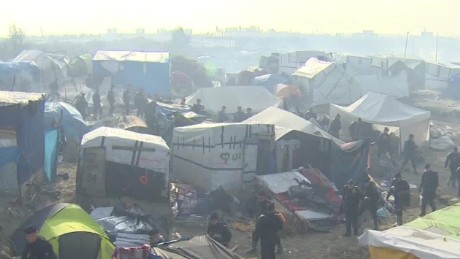 Children to sleep in burned-out refugee camp