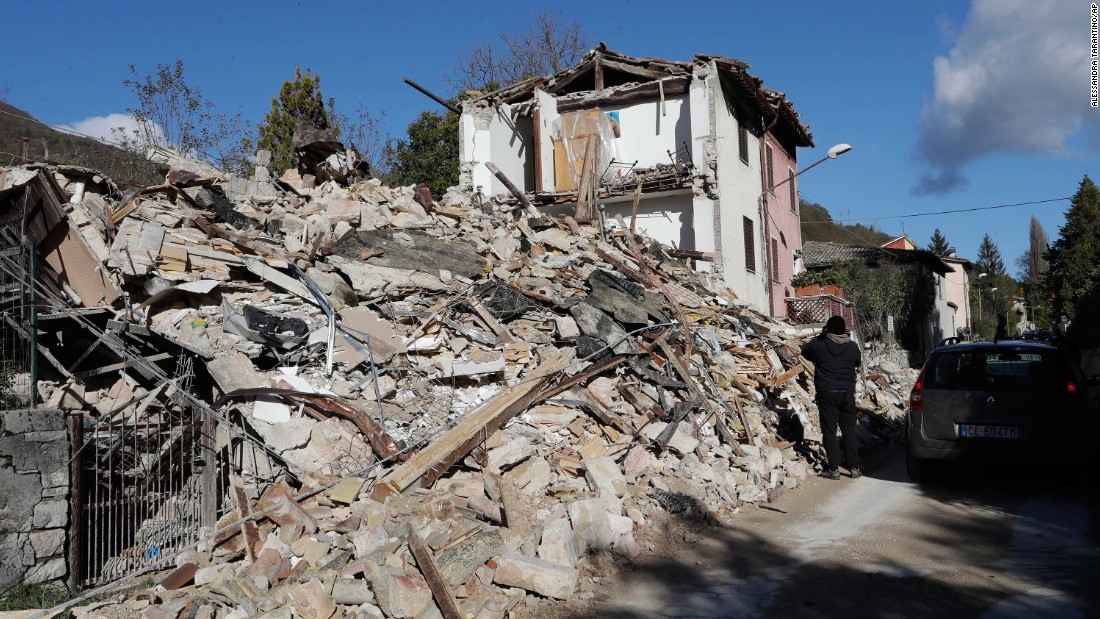 A house lies in ruins in Visso on October 27.