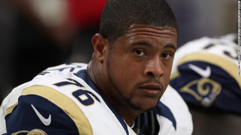 Guard Rodger Saffold #76 of the Los Angeles Rams on the bench during the NFL game against the Arizona Cardinals at the University of Phoenix Stadium on October 2, 2016 in Glendale, Arizona.