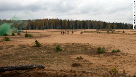 Lithuanian conscripts training alongside US soldiers on a live firing exercise
