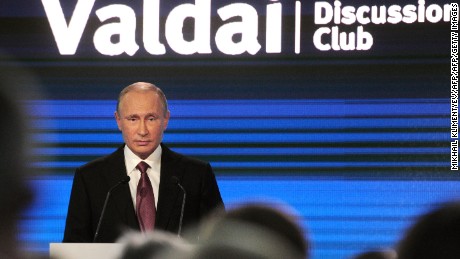 President Putin gives a speech during a meeting of political scientists in Sochi on Thursday. 