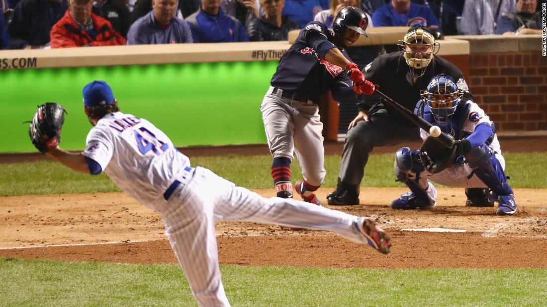 Francisco Lindor of the Cleveland Indians hits a single off of John Lackey of the Chicago Cubs in the third inning in Game 4.