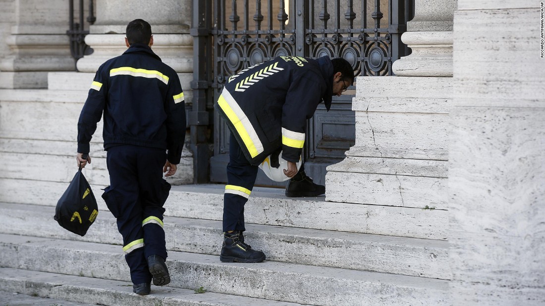 Firefighters from Vatican City check out St. Paul&#39;s Basilica in Rome on October 30 following the earthquake. Several buildings in the Italian capital have suffered minor damage from the series of quakes.
