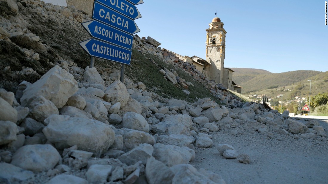 The tower of the Church of the Madonna of the Angels remains standing amid rubble near Norcia on October 30.