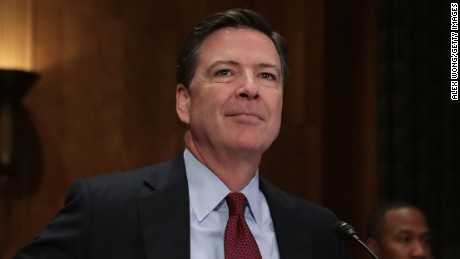 WASHINGTON, DC - SEPTEMBER 27:  FBI Director James Comey waits for the beginning of a hearing before the Senate Homeland Security and Government Affairs Committee September 27, 2016 on Capitol Hill in Washington, DC. The committee held a hearing on &quot;Fifteen Years After 9/11: Threats to the Homeland.&quot;  (Photo by Alex Wong/Getty Images)