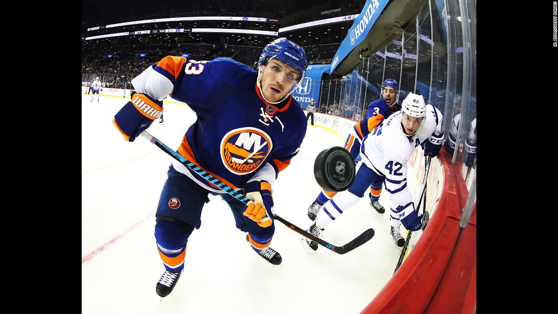 Casey Cizikas, a forward with the New York Islanders, watches the puck during an NHL game against Toronto on Sunday, October 30.