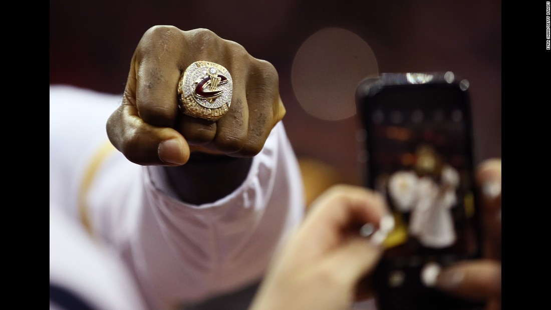 LeBron James shows off the championship ring that he and the rest of the Cleveland Cavaliers received on Tuesday, October 25.