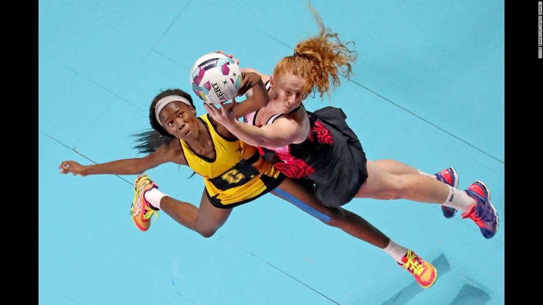 Jamaica&#39;s Nicole Dixon, left, and New Zealand&#39;s Sam Sinclair compete for the ball during a netball match in Melbourne on Sunday, October 30.