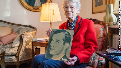 Nina Lagergren,  half-sister of Raoul Wallenberg, holds a picture of her brother in 2015.