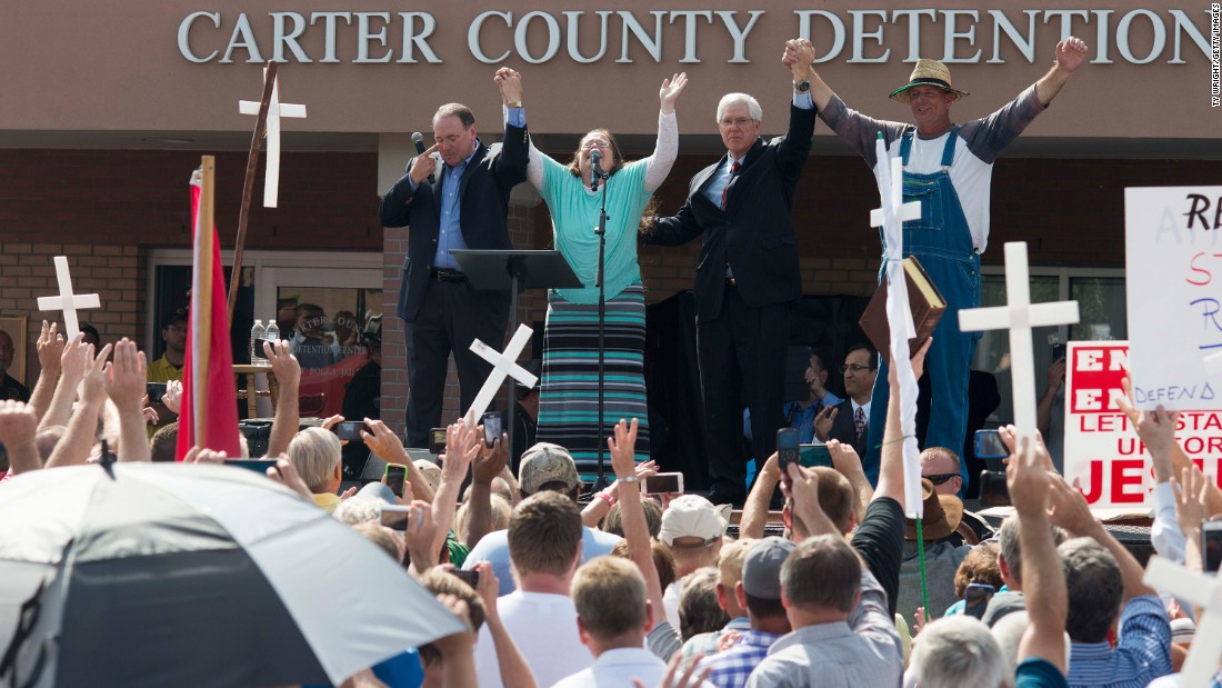 Republican presidential candidate Mike Huckabee, left, holds hands with Kim Davis in front of a detention center in Grayson, Kentucky, on September 8, 2015. Davis, a Rowan County clerk of courts, &lt;a href=&quot;http://www.cnn.com/2015/09/08/politics/kim-davis-kentucky-clerk-2016-candidates-chris-christie/index.html&quot; target=&quot;_blank&quot;&gt;spent several days in jail&lt;/a&gt; for refusing to issue marriage licenses to same-sex couples. Huckabee latched onto Davis as a symbol of the fight against what he said is government overreach.