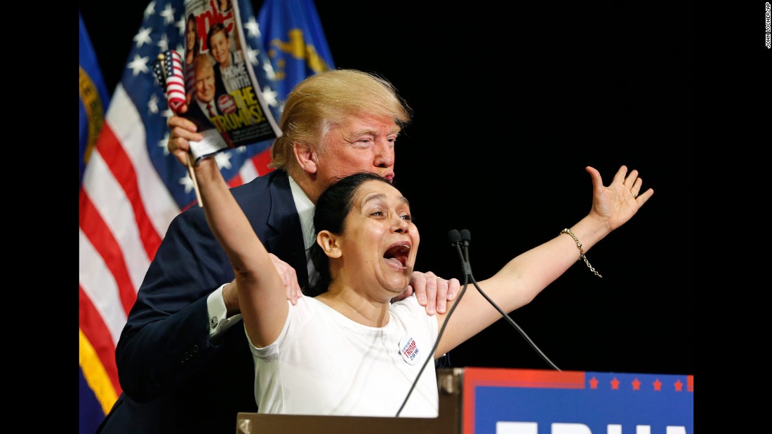 Trump poses with a woman he brought up on stage during a rally in Las Vegas on October 8, 2015. The woman &lt;a href=&quot;http://www.cnn.com/2015/10/08/politics/latino-woman-las-vegas-trump-adoring-fan/&quot; target=&quot;_blank&quot;&gt;kissed Trump&lt;/a&gt; as she clutched a copy of his People magazine cover. &quot;I&#39;m Hispanic and I vote for Mr. Trump! She said. &quot;We vote for Mr. Trump! Yes! Mr. Trump! We love you! We love you, all the way to the White House!&quot; Trump, who had come under fire for his comments about Hispanics, seemed to understand how it might be perceived. &quot;I swear to you -- I think she&#39;s totally beautiful and great -- I&#39;ve never met her before, I swear,&quot; he said.