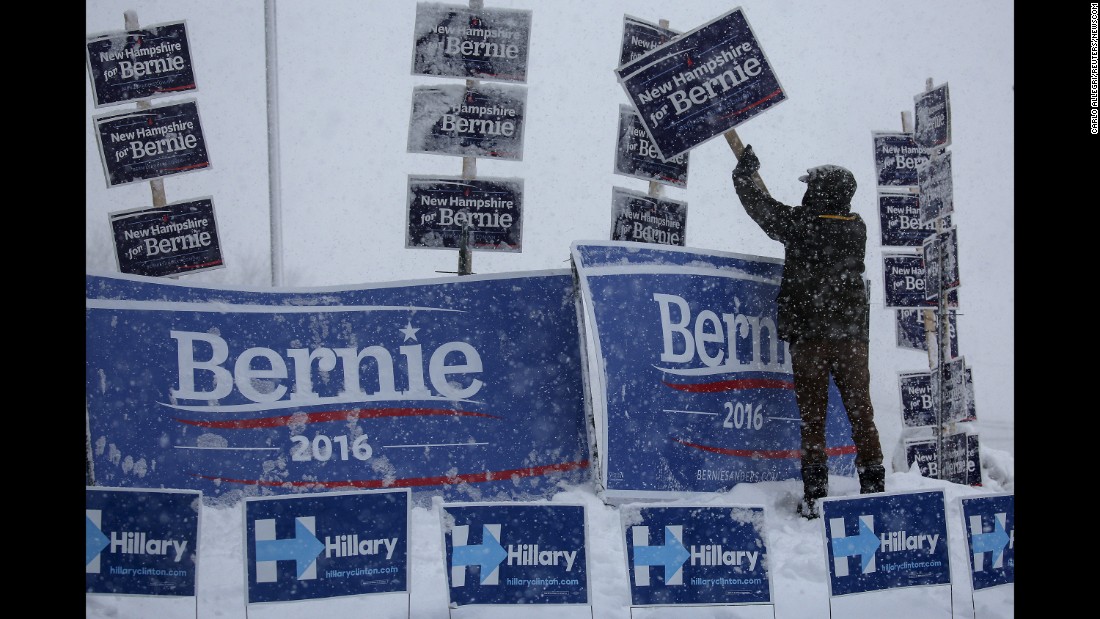 A campaign worker brushes snow off Sanders signs in Manchester, New Hampshire, on February 5, 2016. Sanders &lt;a href=&quot;http://www.cnn.com/2016/02/09/politics/new-hampshire-primary-highlights/&quot; target=&quot;_blank&quot;&gt;won the New Hampshire primary&lt;/a&gt; a few days later.