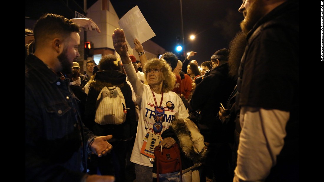 Trump supporter Birgitt Peterson argues with protesters outside a canceled Trump rally in Chicago on March 11, 2016. Peterson &lt;a href=&quot;http://www.chicagotribune.com/news/ct-birgitt-peterson-trump-rally-met-0313-20160312-story.html&quot; target=&quot;_blank&quot;&gt;told the Chicago Tribune&lt;/a&gt; that she responded with a Nazi-style salute after anti-Trump protesters called her a Nazi. Trump&#39;s campaign &lt;a href=&quot;http://www.cnn.com/2016/03/11/politics/donald-trump-chicago-protests/&quot; target=&quot;_blank&quot;&gt;postponed the rally&lt;/a&gt; amid fights between supporters and demonstrators, protests in the streets and concerns that the environment at the event was no longer safe. 