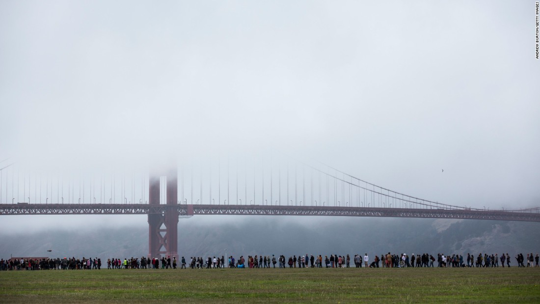 People wait in line to attend a Sanders rally in San Francisco on June 6, 2016.