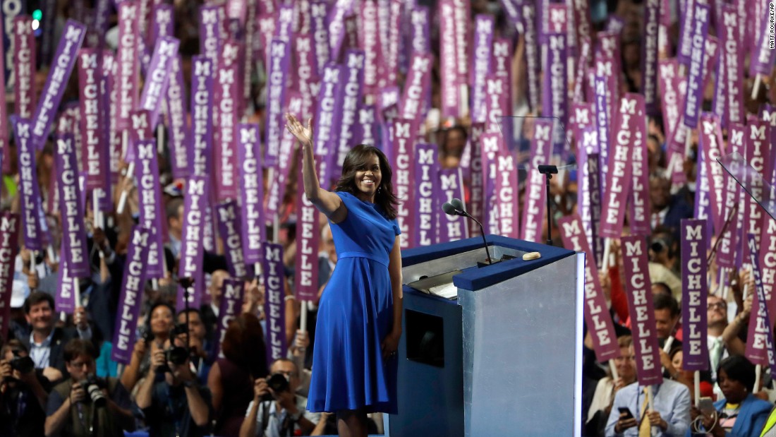 First lady Michelle Obama waves to delegates in Philadelphia as &lt;a href=&quot;http://www.cnn.com/2016/07/25/politics/michelle-obama-dnc-speech/index.html&quot; target=&quot;_blank&quot;&gt;she speaks on the first day of the Democratic National Convention&lt;/a&gt; on July 25, 2016. Obama cast the presidential race as one between a positive role model for children and a damaging one.