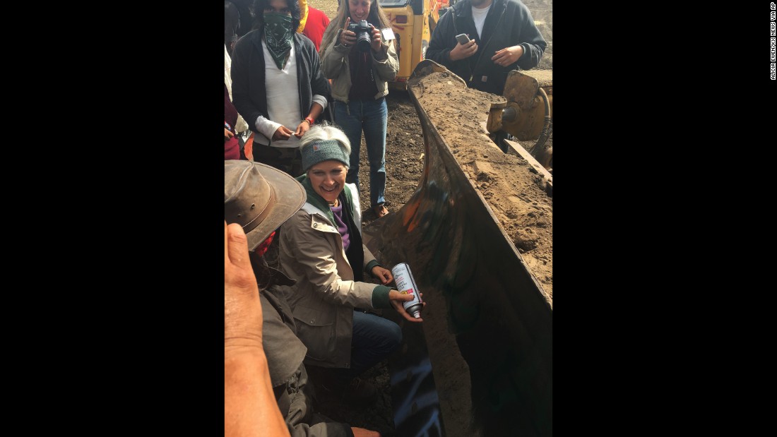 Jill Stein, the Green Party&#39;s presidential candidate, spray-paints a bulldozer &lt;a href=&quot;http://www.cnn.com/2016/09/07/politics/jill-stein-pipeline-protest-trespassing-charges/index.html&quot; target=&quot;_blank&quot;&gt;during a protest against the Dakota Access Pipeline&lt;/a&gt; in Morton County, North Dakota, on September 6, 2016. A North Dakota sheriff&#39;s office charged Stein and her running mate, Ajamu Baraka, with criminal trespass and criminal mischief. Stein, who has a history of environmental activism, said the pipeline&#39;s construction desecrated Native American burial sites.