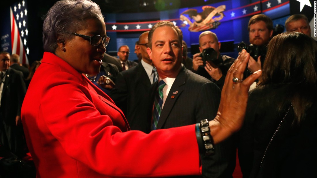 Donna Brazile, acting chairwoman of the Democratic National Committee, talks with Reince Priebus, chairman of the Republican National Committee, before the vice presidential debate. Brazile &lt;a href=&quot;http://money.cnn.com/2016/10/31/media/donna-brazile-cnn-resignation/index.html&quot; target=&quot;_blank&quot;&gt;later resigned from her role as a CNN contributor &lt;/a&gt;amid fresh revelations that she sent questions to Clinton&#39;s campaign in advance of a CNN debate and a CNN-TV One town hall. In a statement, CNN said it was &quot;completely uncomfortable with what we have learned about her interactions with the Clinton campaign while she was a CNN contributor.&quot; CNN said it &quot;never gave Brazile access to any questions, prep material, attendee list, background information or meetings in advance of a town hall or debate.&quot;