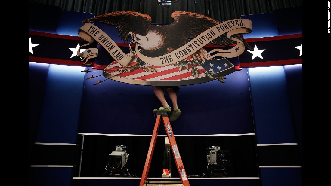 Workers prepare the stage for &lt;a href=&quot;http://www.cnn.com/2016/10/09/politics/gallery/second-presidential-debate/index.html&quot; target=&quot;_blank&quot;&gt;the second presidential debate,&lt;/a&gt; which took place in St. Louis on October 7, 2016.