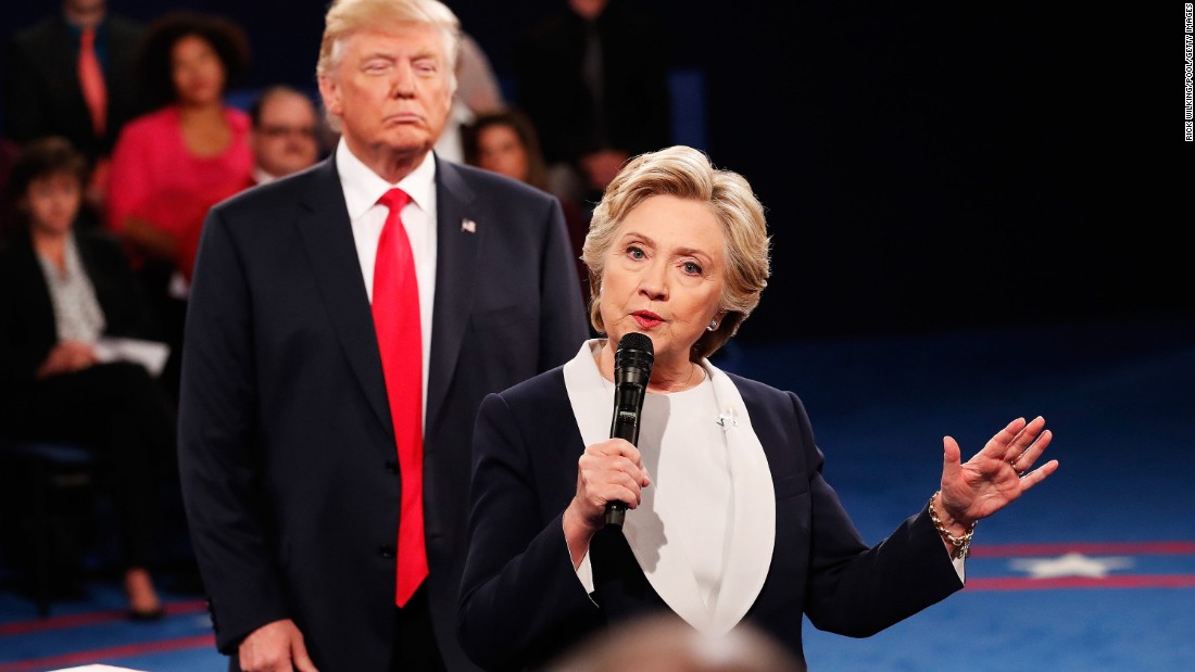 Trump &lt;a href=&quot;http://www.cnn.com/2016/10/09/politics/donald-trump-looming-hillary-clinton-presidential-debate/&quot; target=&quot;_blank&quot;&gt;looms behind Clinton&lt;/a&gt; at the second debate, which was a town-hall format with questions from undecided voters.