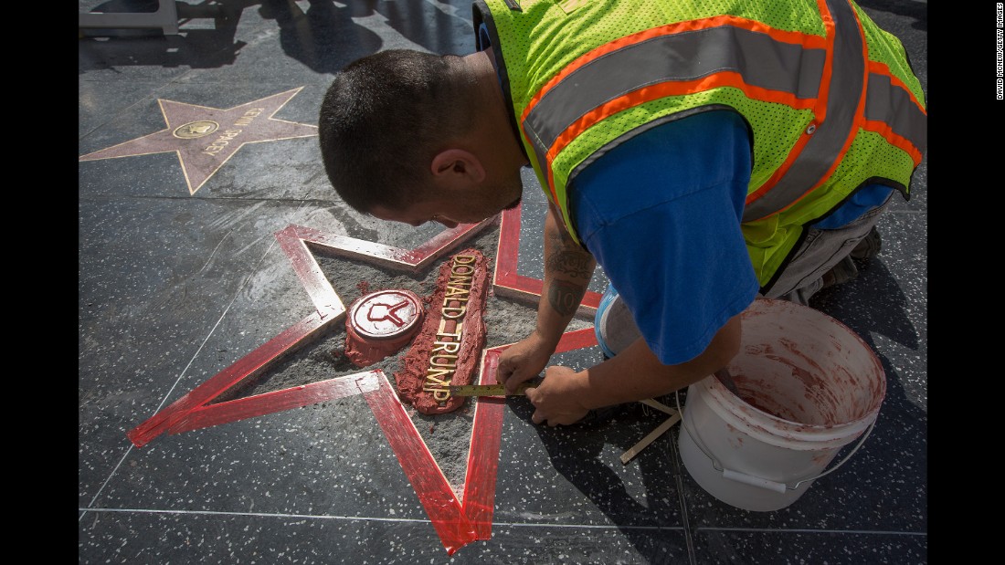 Workers repair Trump&#39;s star on the Hollywood Walk of Fame after &lt;a href=&quot;http://www.cnn.com/2016/10/26/politics/hollywood-star-donald-trump-vandalism/index.html&quot; target=&quot;_blank&quot;&gt;it was vandalized&lt;/a&gt; on October 26, 2016.