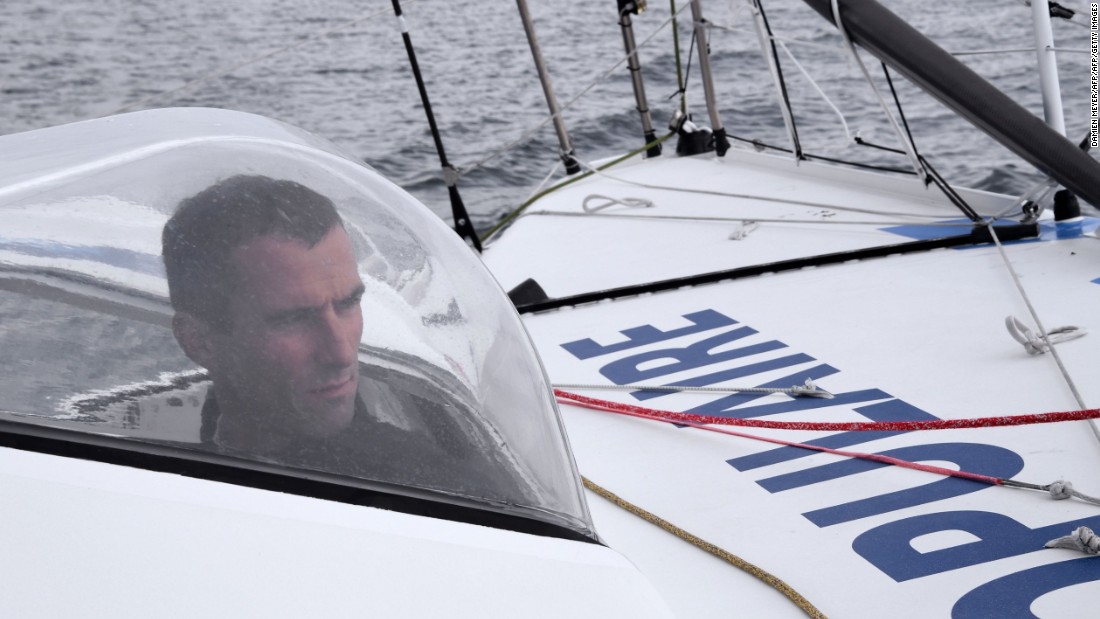 Protected from the elements -- French skipper Armel le Cleac&#39;h on Banque Populaire off the Port-la-Foret coast, western France. Not yet 40, he has already been a runner-up twice in the Vendee Globe.