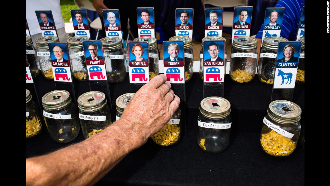 People at &lt;a href=&quot;http://www.cnn.com/2015/08/15/politics/gallery/iowa-state-fair-postcards/index.html&quot; target=&quot;_blank&quot;&gt;the Iowa State Fair&lt;/a&gt; use corn kernels to show support for their favorite presidential candidates on August 13, 2015. Many candidates attended the fair, mingling with voters in the first-in-the-nation caucus state.