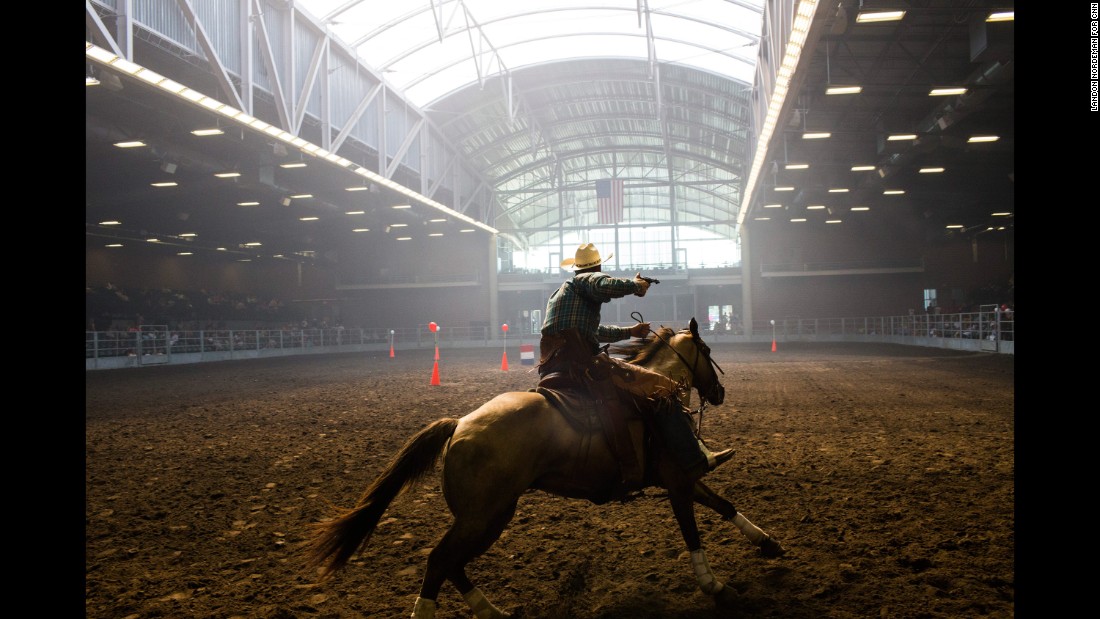 Brian Bolton, from Creston, Iowa, participates in a mounted shooting competition at the Iowa State Fair on August 14, 2015. Photographer Landon Nordeman &lt;a href=&quot;http://www.cnn.com/2015/08/15/politics/gallery/iowa-state-fair-postcards/index.html&quot; target=&quot;_blank&quot;&gt;visited the fair&lt;/a&gt; in search of presidential candidates and interesting people.