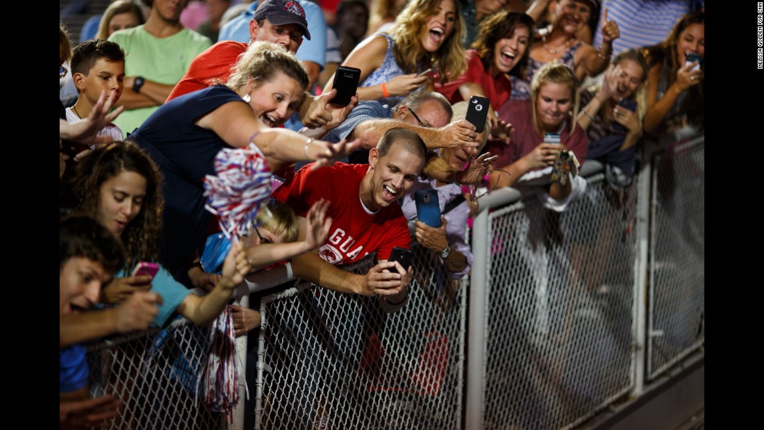 Trump supporters take photos of Trump as he leaves a rally in Mobile, Alabama, on August 21, 2015. The rally &lt;a href=&quot;http://www.cnn.com/2015/08/22/politics/gallery/trump-rally-alabama/index.html&quot; target=&quot;_blank&quot;&gt;was held in a football stadium&lt;/a&gt; to accommodate 30,000 supporters.