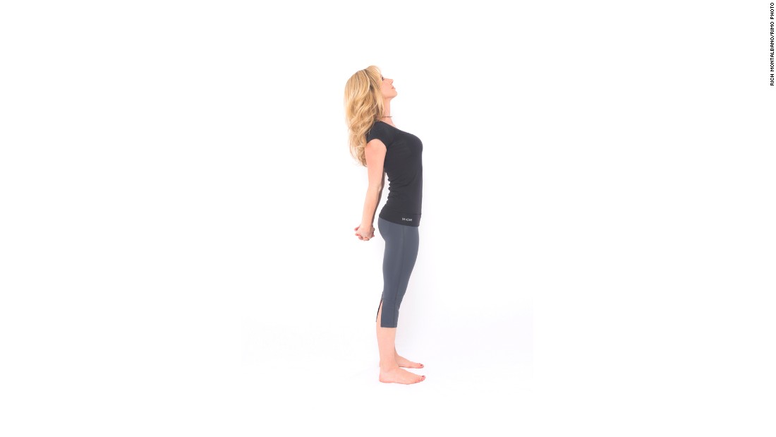 To release upper-body tension, from standing, clasp your hands behind your back and straighten your arms to the best of your ability as you look up, opening your chest, neck and shoulders. Hold the posture for a few breaths. Release and repeat.