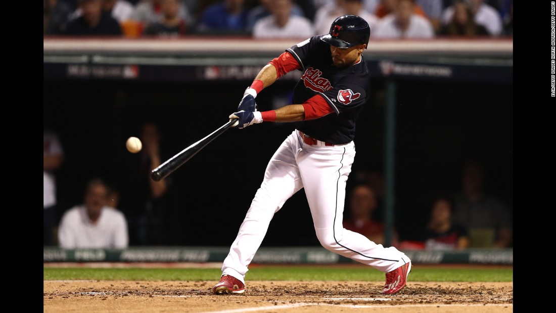 Coco Crisp of the Indians hits a double during the third inning in Game 7.