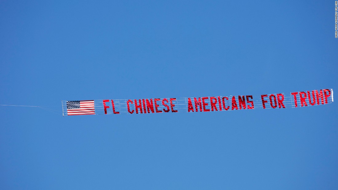 A banner flies overhead at a Trump rally in Orlando on November 2.